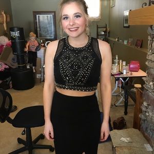 Long black 2-piece prom dress.